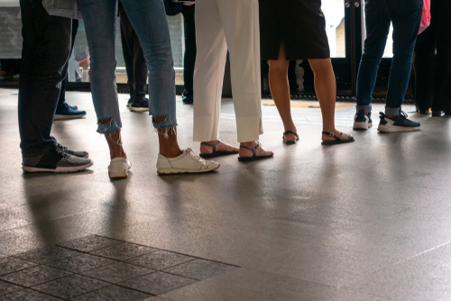 people waiting in line for food